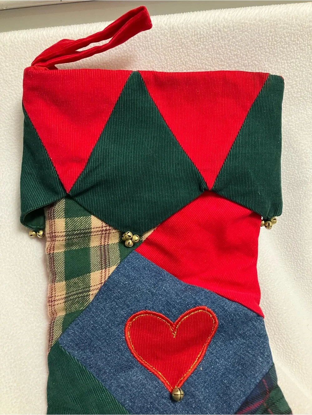 retired Pier 1 Imports patchwork quilt Christmas stocking. Red heart. Tiny bells